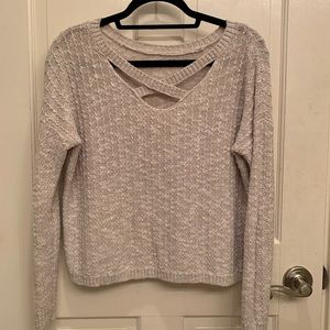 criss-cross neckline sweater